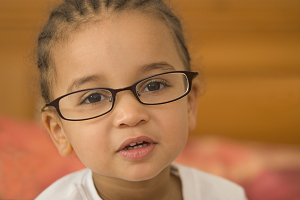 child with glasses