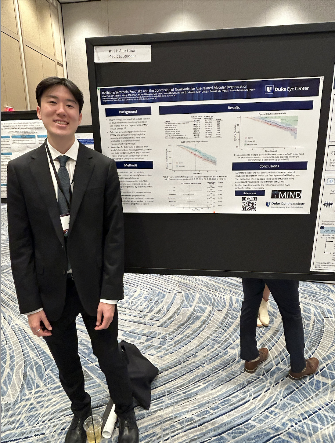 Med student with poster 