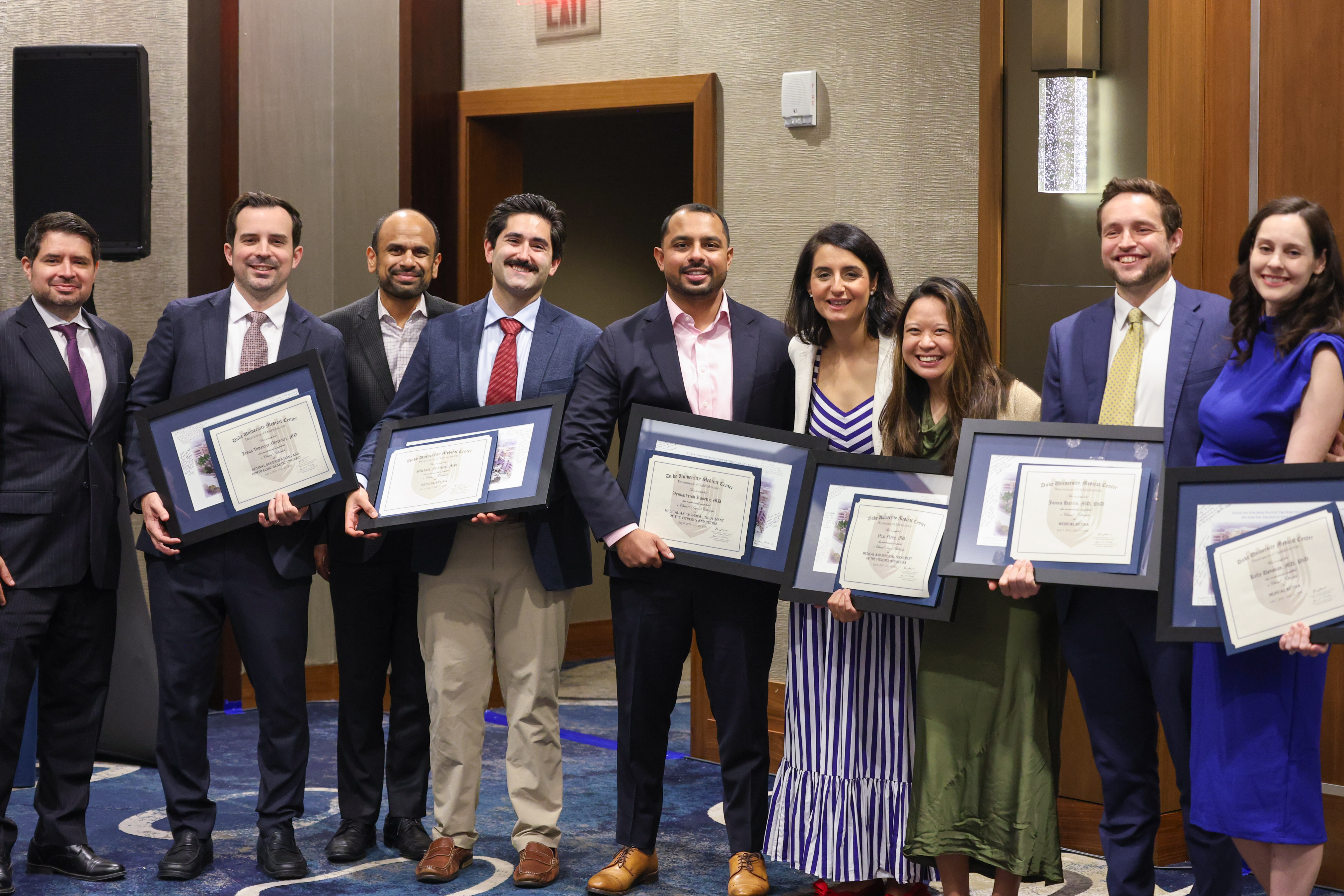 Retina fellow group with diplomas 