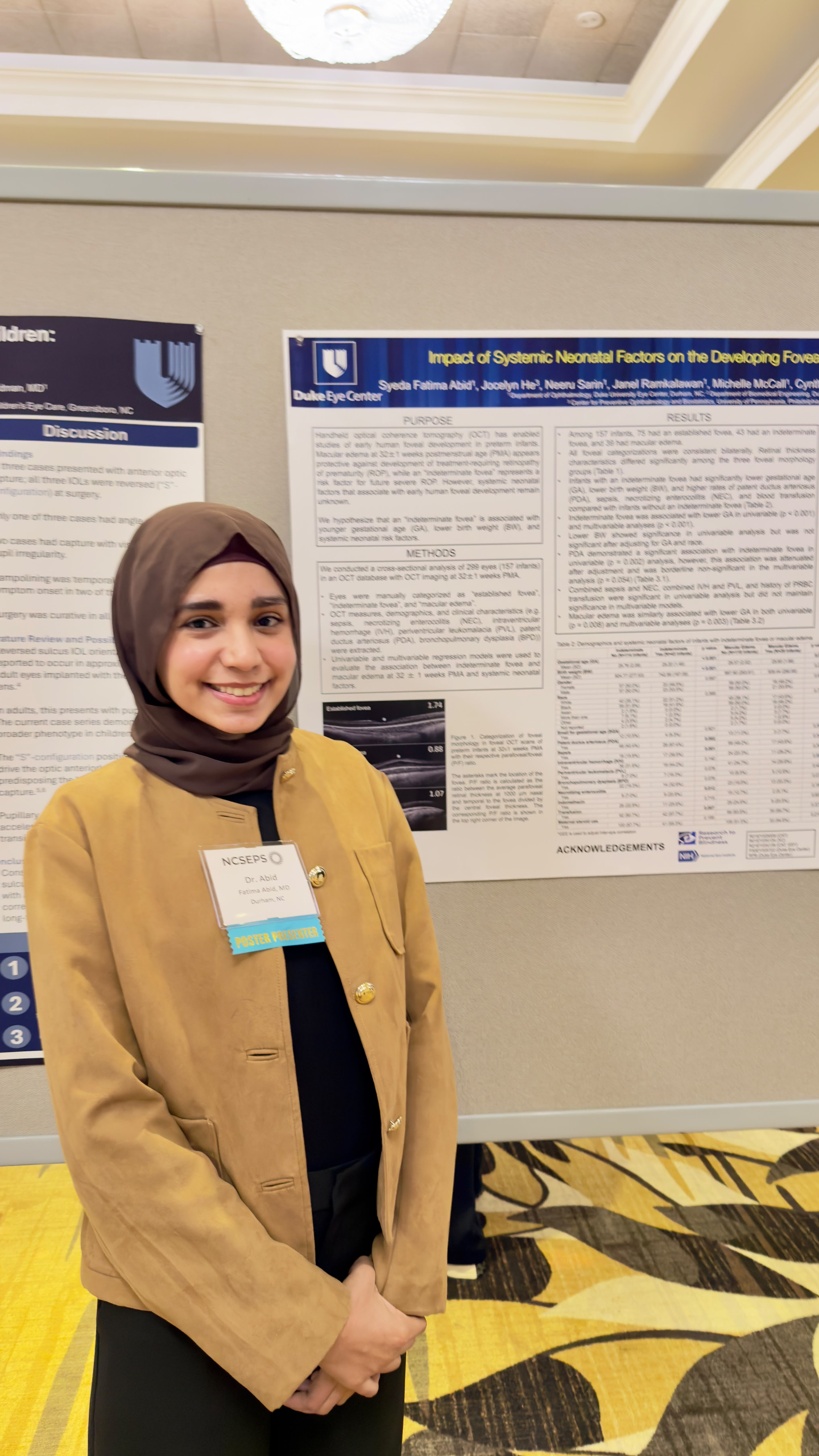 student with poster