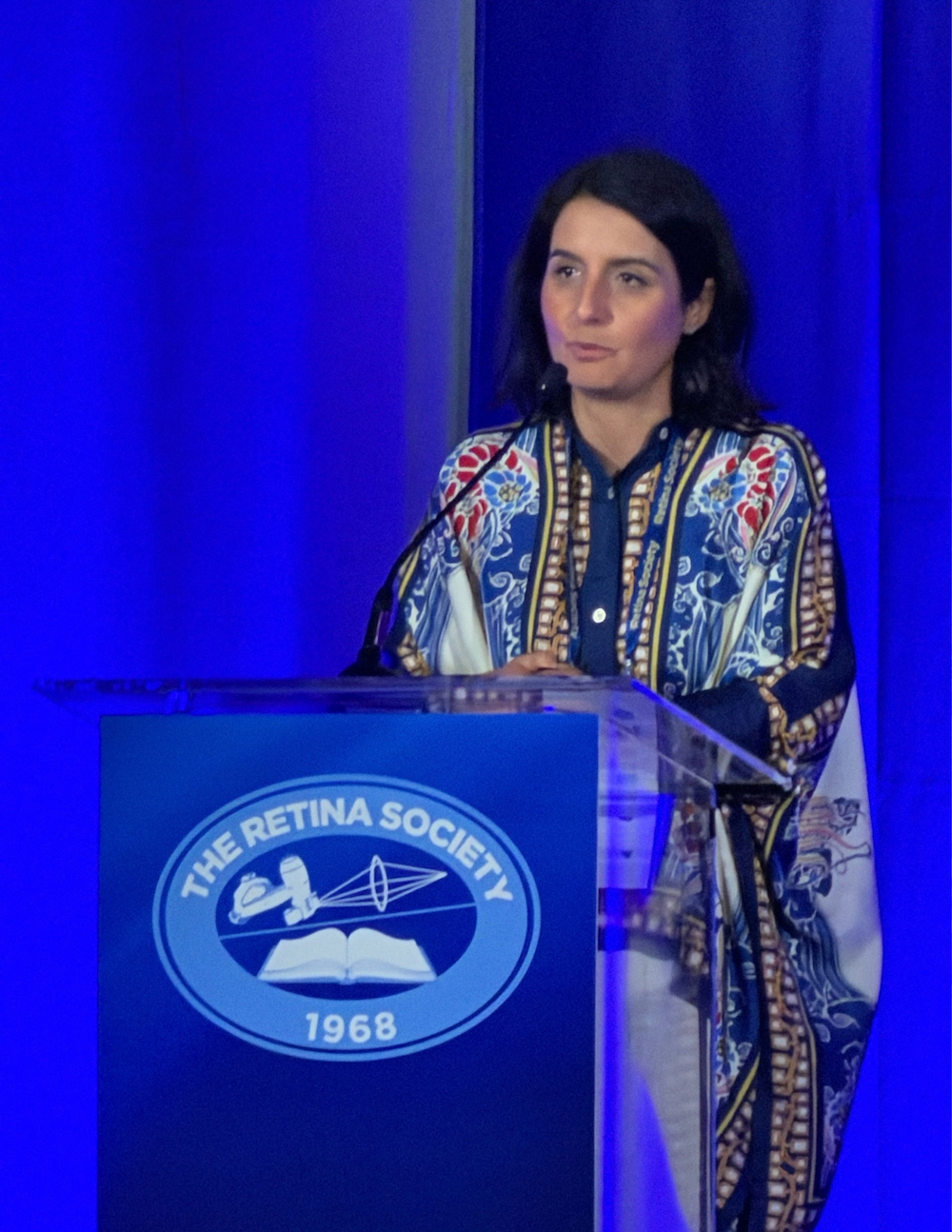Dr. Vajzovic presenting at podium