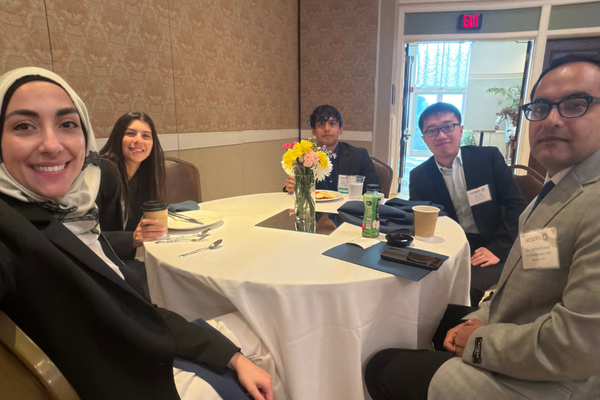 Vajzvoic team at table