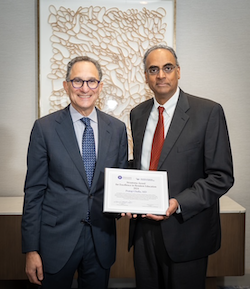 Pratap Challa receiving the Straastma Award atAUPO 2025.