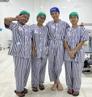 Song and OR technincians standing in OR