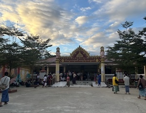 Sitagu Buddhist Monastery. Patients congregate around the hospital courtyard waiting to be seen. 
