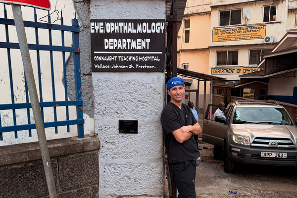 Duke GO Fellow outside of Sierra Leone hospital 