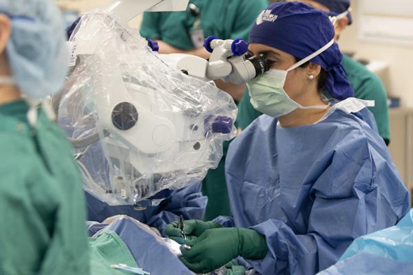 eye surgeon performing surgery