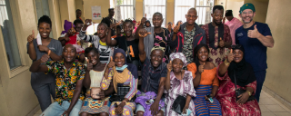 Group of happy people in Sierra Leone who have had their vision restored
