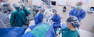 Dr. Materin in surgery treating an ocular tumor