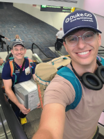 WILLIAMS AND FELLOW IN AIRPORT