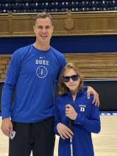 Scheyer with kid captain